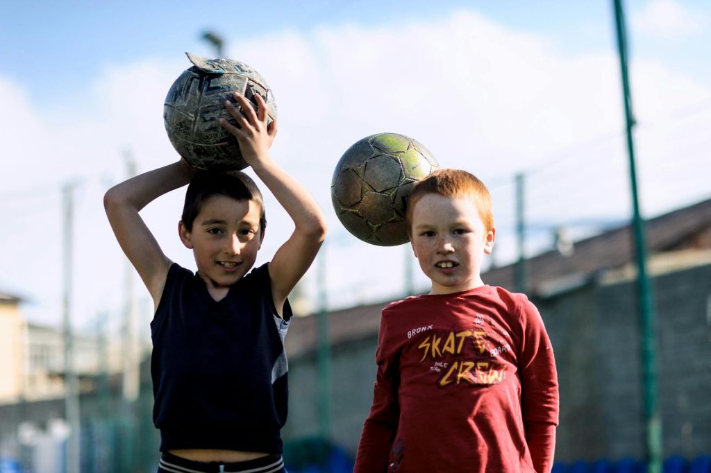 Young Boys with Football Balls